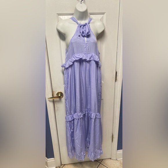 Purple Ruffled Tiered Maxi Sundress
A romantic and feminine maxi sundress L - Picture 1 of 7